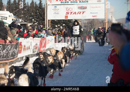 FILE - In this March 6, 2017, file photo, Dallas Seavey, four-time Iditarod winner and reigning champion, is aiming for his fifth Iditarod crown in six years. Seavey took off wearing bib #18 at the start of the 45th Iditarod Trail Sled Dog Race in Fairbanks, Alaska. Four-time Iditarod champion Seavey denies he administered banned drugs to his dogs in this year's race, and has withdrawn from the 2018 race in protest. The Iditarod Trail Committee on Monday, Oct. 23, 2017, identified Seavey as the musher who had four dogs test positive for a banned opioid pain reliever after finishing the race la