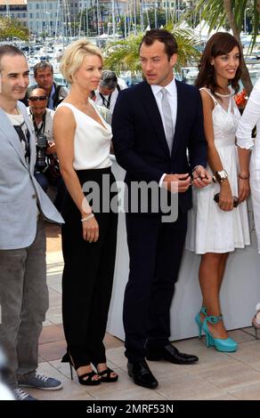 Olivier Assayas, Linn Ullmann, Jude Law et Martina Gusman au photocall pour le jury lors du Festival de Cannes 64th. Cannes, France. 5/11/11. Banque D'Images