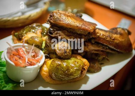 Plat de cochon péruvien alias Cuy Banque D'Images