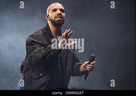 FILE - In this Oct. 8, 2016 file photo, Drake performs onstage in Toronto. Drake leads the nominations for the 2017 iHeartRadio Music Awards with 12, including male artist of the year, announced Wednesday, Jan. 4, 2017. (Photo by Arthur Mola/Invision/AP, File)