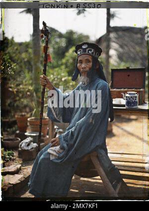 Environs de Hà-Nôi, Tonkin, Indochina un village remarquable en tenue de cérémonie, Léon occupé à Indochina Banque D'Images