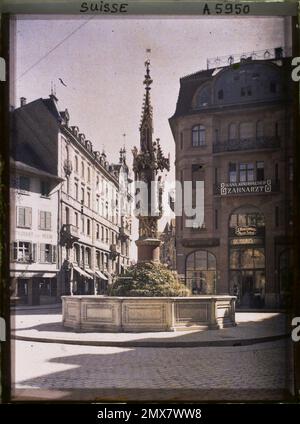 Bâle, Suisse la Fontaine de marché aux poissons , 1911 - Suisse - Auguste Léon Banque D'Images