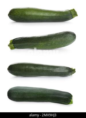 Ensemble de courgettes fraîches mûres sur fond blanc Banque D'Images