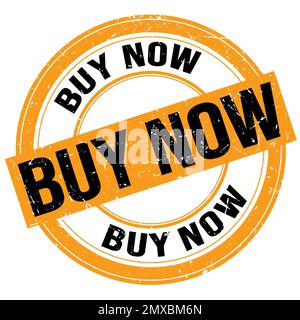 ACHETER MAINTENANT texte écrit sur orange-noir rond timbre signe grungy Banque D'Images