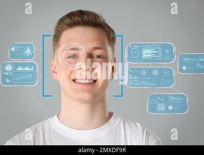 Système de reconnaissance faciale. Homme avec le cadre du scanner sur le visage et les informations Banque D'Images