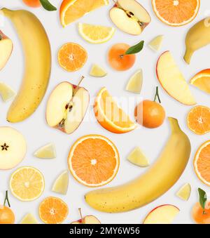 Aménagement tropical avec différents fruits frais sur fond clair, vue du dessus Banque D'Images