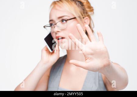 Femme d'affaires appel important, ne pas déranger Banque D'Images