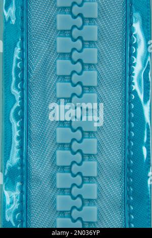 Tissu plastique à fermeture éclair bleue macro pour l'industrie du tissu Banque D'Images