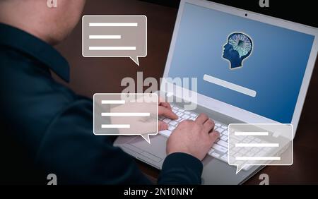 Un homme utilisant l'intelligence artificielle chatbot pour parler à l'IA Banque D'Images