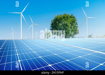 Une éolienne et un panneau solaire sont des énergies renouvelables. Les deux technologies sont utilisées pour fournir de l'énergie renouvelable aux entreprises Banque D'Images