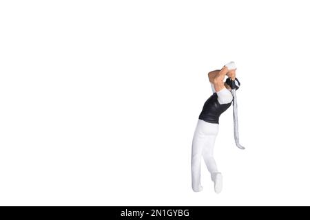 golfeur en action, isolé sur fond blanc, scène de personnes miniatures Banque D'Images