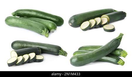 Ensemble de courgettes fraîches mûres sur fond blanc Banque D'Images