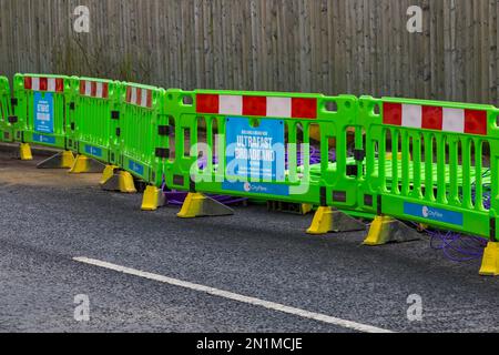 Travaux entrepris par City Fiber pour installer un tout nouveau réseau haut débit ultra-rapide dans la région de Poole, Dorset UK, en février Banque D'Images