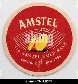 Dessous de verre en carton d'époque avec logo Amstel Beer. Amstel est une société hollandaise de brassage. Fondé 11 juin 1870 à Amsterdam, nommé d'après la rivière Amstel. Banque D'Images