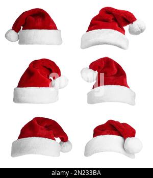 Ensemble de chapeaux de père Noël rouges sur fond blanc Banque D'Images