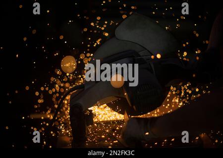 Étincelles du soudage. Découpe des métaux. Détails de production. Arrière-plan industriel. Banque D'Images