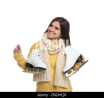 Femme heureuse avec patins à glace sur fond blanc Banque D'Images