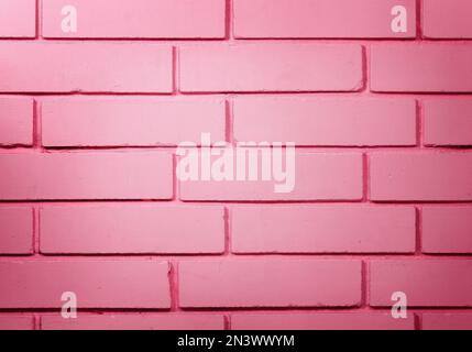 Le mur de briques peint en rose, teinté en rose Banque D'Images