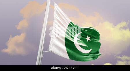 le pakistan agite le drapeau dans un ciel magnifique. Banque D'Images