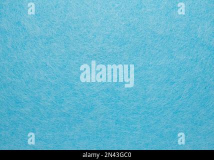 Arrière-plan bleu abstrait recouvert de toiles d'araignée de fibres blanches. Banque D'Images