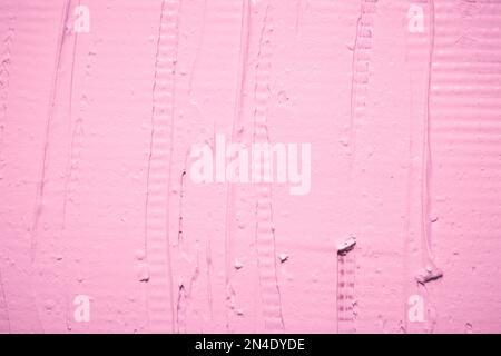 Paroi plâtrée. Couleur rose, texture de mastic rugueux. Banque D'Images