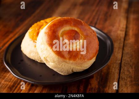 Bisquet. Aussi connu sous le nom de Bisquets Chinos, c'est un des pains traditionnels au Mexique, couramment consommé chaud, coupé en moitié et étaler avec le beurre et f Banque D'Images