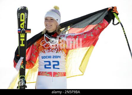 Germany's Maria Hoefl-Riesch poses for photographers on the podium after winning the silver medal in the women's super-G at the Sochi 2014 Winter Olympics, Saturday, Feb. 15, 2014, in Krasnaya Polyana, Russia. (AP Photo/Gero Breloer)