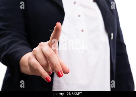 Gros plan de l'index féminin touchant l'affichage invisible comme espace publicitaire comme femme d'affaires concept entrepreneur isolé sur fond blanc studio Banque D'Images