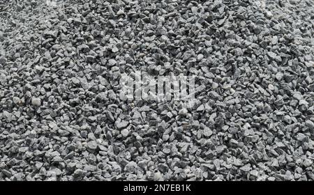 Graviers de granit matériaux pour l'industrie de la construction, vue de texture de fond du gravier de granit concassé Banque D'Images