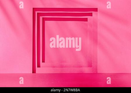 Arrière-plan de la géométrie de couleur tendance magenta à l'intérieur avec cadre et lumière du soleil pour montrer le produit. Photo de haute qualité Banque D'Images