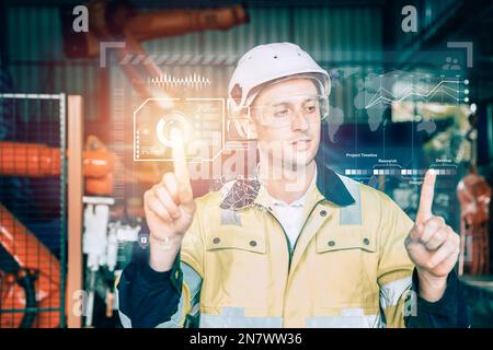 advance industry engineer mâle utilisant l'interface graphique hologramme pour le concept industriel de technologie moderne Banque D'Images
