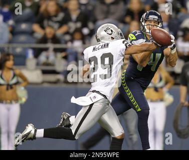 Photo: Green Bay Packers Tramon Williams (38) and M.D. Jennings defend  against Seattle Seahawks' Charly Martin in the end zone at CenturyLink  Field in Seattle. - SEA2012092305 