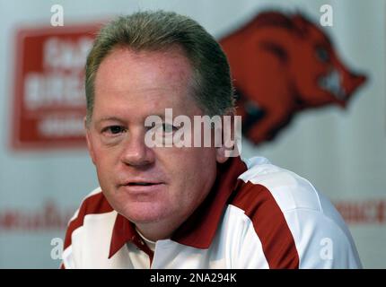 FILE - This Aug. 6, 2011 file photo shows Arkansas college football coach Bobby Petrino speaking to reporters in Fayetteville, Ark. A State Police official says Petrino crashed his motorcycle Sunday night, April 1, 2012, on Arkansas Highway 16 in Madison County near the community of Crosses, and was taken to a hospital for treatment. (AP Photo/Danny Johnston, File)