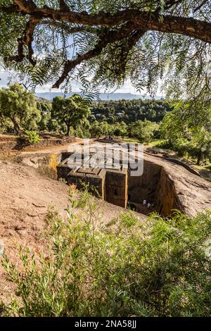 Biete Ghiorgis (Maison de Saint-Georges) Église orthodoxe éthiopienne souterraine monolithique taillée dans la roche dans le groupe nord des églises taillées dans la roche Banque D'Images