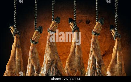 Trancher du jambon espagnol. Jambon espagnol et cuisine traditionnelle. Jambon espagnol sec, jambon de Jamon Serrano, Bellota, jambon italien Prosciutto Crudo ou jambon de Parme. Banque D'Images