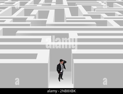 Homme d'affaires sérieux essayant de sortir du labyrinthe Banque D'Images