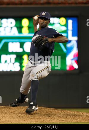 Milwaukee Brewers pitcher LaTroy Hawkins falls as he delivers against the  Minnesota Twins in a baseball game Friday, July 1, 2011 in Minneapolis. (AP  Photo/Andy King Stock Photo - Alamy