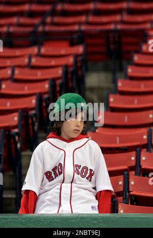 Boston Red Sox fan Lynn Hendrickson of Nashua, N.H. reacts as she is  introduced while modeling the new alternate home uniform jersey in Boston  Thursday, Dec. 11, 2008. (AP Photo/Elise Amendola Stock