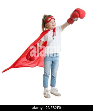 Petite fille en costume de super-héros sur fond blanc Banque D'Images