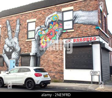 Art mural dans une boutique d'angle de Kinmel Street Liverpool Banque D'Images