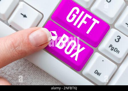 Texte montrant inspiration Gift Box, Word pour Un petit cointainer avec des dessins capables de manipuler des cadeaux Banque D'Images