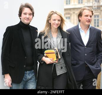 Alexandre Arnault, from left, Antoine Arnault, Delphine Arnault, LVMH CEO  Bernard Arnault and Paul McCartney attend the Stella McCartney  ready-to-wear Spring/Summer 2023 fashion collection presented Monday, Oct.  3, 2022 in Paris. (Photo