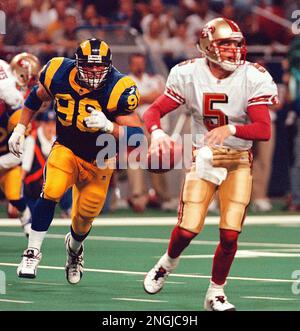 49ERS POSEY/C/02AUG98/SP/MAC SF 49ers vs. New England Patriots. Patriot  Quarterback #16- Scott Zolak is hit by 49er #96-Jeff Posey which caused a  fumble resulting in a 49er TD. 2nd quarter. PHOTO By