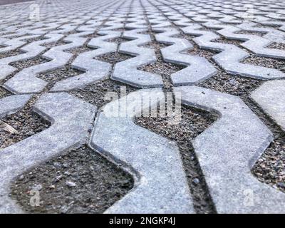 Herbe ECO chaussée d'un parking. Nouvelle texture de revêtement en béton sans couture Banque D'Images