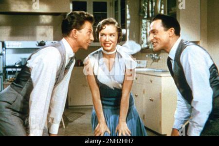 SINGIN' DANS LE FILM DE LA PLUIE 1952 avec de gauche: Donald O'Connor, Debbie Reynolds, Gene Kelly Banque D'Images