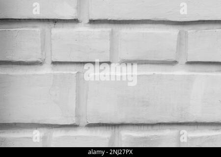 Mur blanc avec motif rustication classique, détails de l'architecture classique, vue de face, texture de la photo d'arrière-plan Banque D'Images