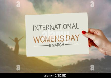 Carte internationale de fête des femmes à portée de main. Salutation pour le 8 mars Journée des femmes heureux et le 25 novembre Journée internationale pour l'élimination de la violence contre Banque D'Images