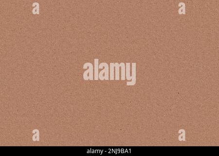 Papier kraft en carton recyclé lisse brun clair, texture tiléable sans couture, largeur de l'image 20cm. Banque D'Images