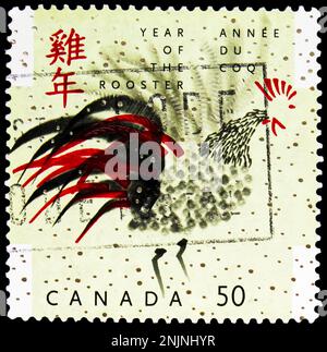 MOSCOU, RUSSIE - le 15 FÉVRIER 2023 : timbre-poste imprimé au Canada indique l'année du coq, nouvel an chinois 2005 - année de la série du coq, circ Banque D'Images