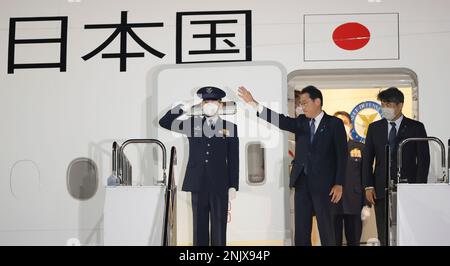 Japanese Prime Minister Fumio Kishida gets on board a special aircraft at Haneda Airport in Tokyo on June 26, 2022, Prime Minister Kishida left Japan during a upper house election to attend the G7 Summit at Schloss Elmau, in the Wetterstein Mountains of Upper Bavaria, starting on June 26. ( The Yomiuri Shimbun via AP Images )
